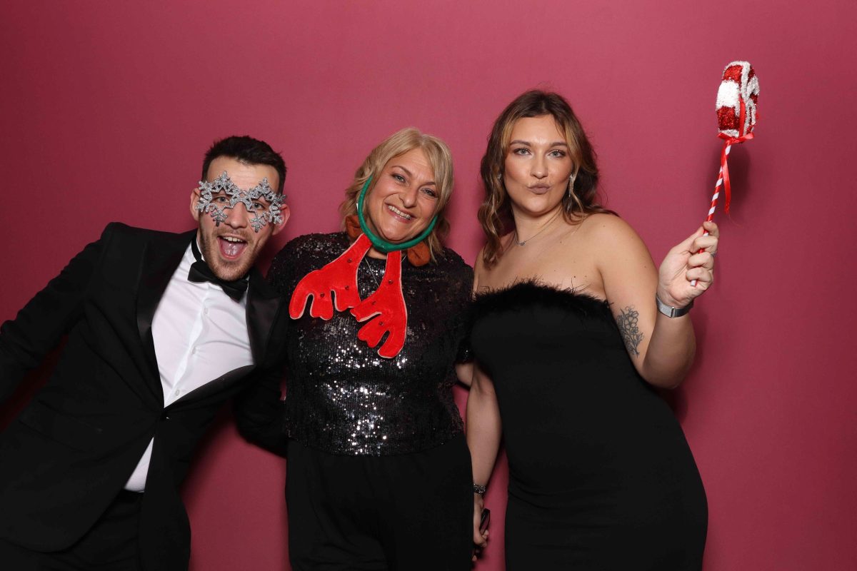 GROUP OF PEOPLE IN CHRISTMAS PARTY PHOTO BOOTH, CORPORATE PARTY YORK, YORK RACECOURSE, CHRISTMAS PARTY PHOTO BOOTH, PHOTO BOOTH HIRE NORTH YORKSHIRE, PHOTO BOOTH HIRE NORTH EAST, PHOTO BOOTH HIRE YORKSHIRE