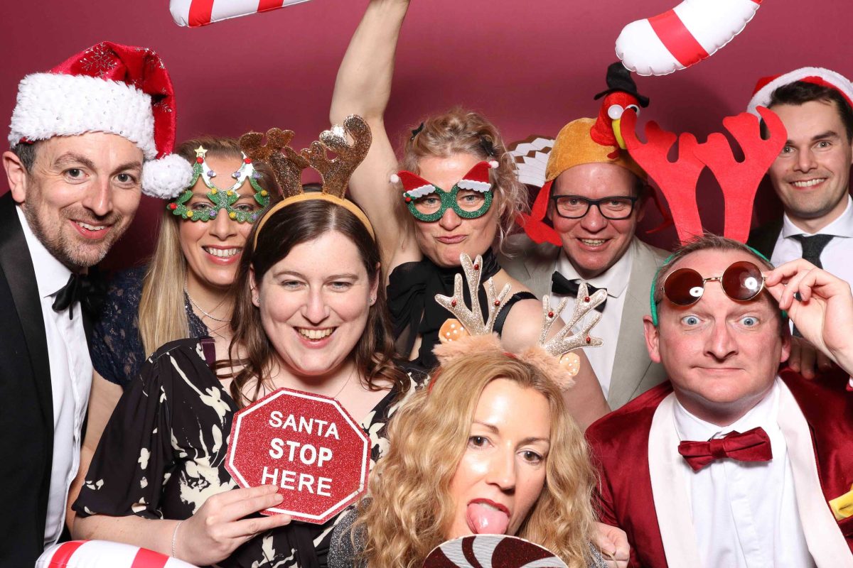 GROUP OF PEOPLE IN CHRISTMAS PROPS, CHRISTMAS PARTY PHOTO BOOTH, CORPORATE PARTY YORK, YORK RACECOURSE, CHRISTMAS PARTY PHOTO BOOTH, PHOTO BOOTH HIRE NORTH YORKSHIRE, PHOTO BOOTH HIRE NORTH EAST, PHOTO BOOTH HIRE YORKSHIRE